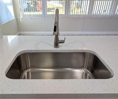 MOVE-IN READY!  This stunning 2-bedroom, 2-bathroom BALDWIN on Mainlands Golf Club in Florida - for sale on GolfHomes.com, golf home, golf lot