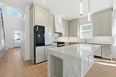 Brand-new 2025 coastal luxury home just steps from the Gulf! on Sharks Tooth Golf Club in Florida - for sale on GolfHomes.com, golf home, golf lot