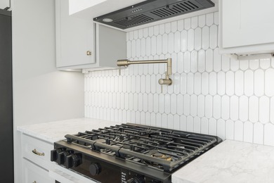 Brand-new 2025 coastal luxury home just steps from the Gulf! on Sharks Tooth Golf Club in Florida - for sale on GolfHomes.com, golf home, golf lot