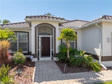 SILVERLAKES SHOWSTOPPER WITH BRAND NEW TILE ROOF & WATERFRONT on Gateway Golf and Country Club in Florida - for sale on GolfHomes.com, golf home, golf lot