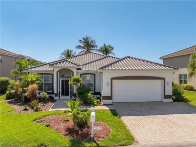 SILVERLAKES SHOWSTOPPER WITH BRAND NEW TILE ROOF & WATERFRONT on Gateway Golf and Country Club in Florida - for sale on GolfHomes.com, golf home, golf lot