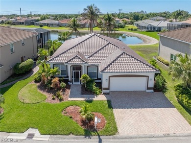 SILVERLAKES SHOWSTOPPER WITH BRAND NEW TILE ROOF & WATERFRONT on Gateway Golf and Country Club in Florida - for sale on GolfHomes.com, golf home, golf lot