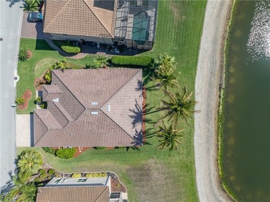 SILVERLAKES SHOWSTOPPER WITH BRAND NEW TILE ROOF & WATERFRONT on Gateway Golf and Country Club in Florida - for sale on GolfHomes.com, golf home, golf lot