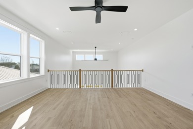 Brand-new 2025 coastal luxury home just steps from the Gulf! on Sharks Tooth Golf Club in Florida - for sale on GolfHomes.com, golf home, golf lot