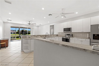 SILVERLAKES SHOWSTOPPER WITH BRAND NEW TILE ROOF & WATERFRONT on Gateway Golf and Country Club in Florida - for sale on GolfHomes.com, golf home, golf lot