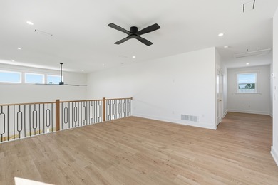 Brand-new 2025 coastal luxury home just steps from the Gulf! on Sharks Tooth Golf Club in Florida - for sale on GolfHomes.com, golf home, golf lot