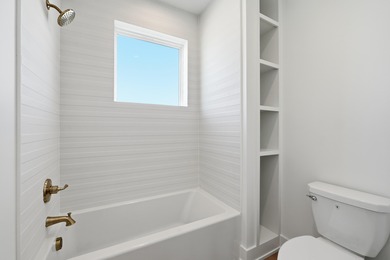 Brand-new 2025 coastal luxury home just steps from the Gulf! on Sharks Tooth Golf Club in Florida - for sale on GolfHomes.com, golf home, golf lot