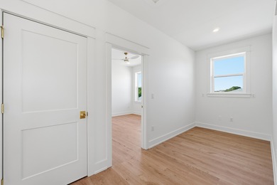 Brand-new 2025 coastal luxury home just steps from the Gulf! on Sharks Tooth Golf Club in Florida - for sale on GolfHomes.com, golf home, golf lot