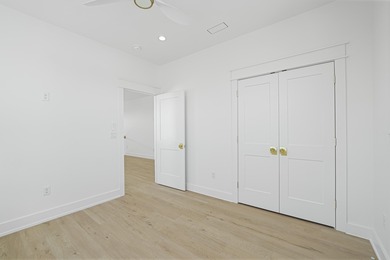 Brand-new 2025 coastal luxury home just steps from the Gulf! on Sharks Tooth Golf Club in Florida - for sale on GolfHomes.com, golf home, golf lot