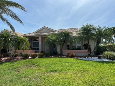 ESCAPE TO YOUR WATERFRONT DREAM HOME IN PUNTA GORDA ISLES! This on Saint Andrews South Golf Club in Florida - for sale on GolfHomes.com, golf home, golf lot