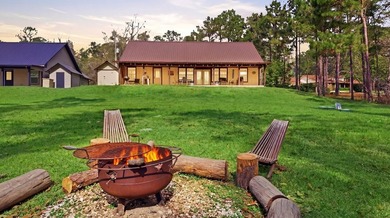 Experience lakeside living at its finest with this stunning 3 on Rayburn Country Club in Texas - for sale on GolfHomes.com, golf home, golf lot