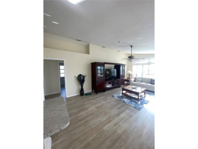 ESCAPE TO YOUR WATERFRONT DREAM HOME IN PUNTA GORDA ISLES! This on Saint Andrews South Golf Club in Florida - for sale on GolfHomes.com, golf home, golf lot