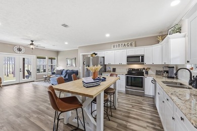 Experience lakeside living at its finest with this stunning 3 on Rayburn Country Club in Texas - for sale on GolfHomes.com, golf home, golf lot