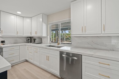 Your Private Oasis Awaits in Whippoorwill Lakes! Tucked away in on Banyan Golf Club in Florida - for sale on GolfHomes.com, golf home, golf lot