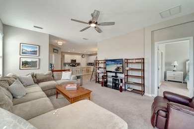 Elegantly maintained and beautifully appointed, this 3-bedroom on The Founders Golf Club in Florida - for sale on GolfHomes.com, golf home, golf lot