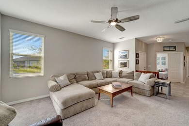 Elegantly maintained and beautifully appointed, this 3-bedroom on The Founders Golf Club in Florida - for sale on GolfHomes.com, golf home, golf lot