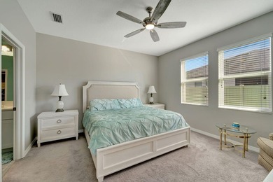 Elegantly maintained and beautifully appointed, this 3-bedroom on The Founders Golf Club in Florida - for sale on GolfHomes.com, golf home, golf lot