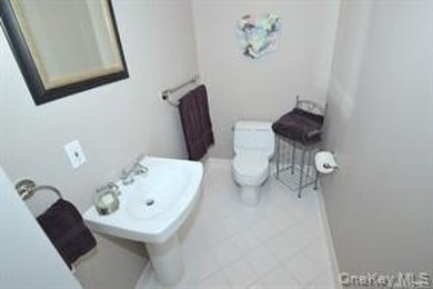 ELEGANT VISCAYA VILLA IN THE GREENS with FULL FINISHED BASEMENT on The Greens At Half Hollow in New York - for sale on GolfHomes.com, golf home, golf lot