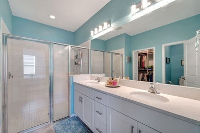 Elegantly maintained and beautifully appointed, this 3-bedroom on The Founders Golf Club in Florida - for sale on GolfHomes.com, golf home, golf lot