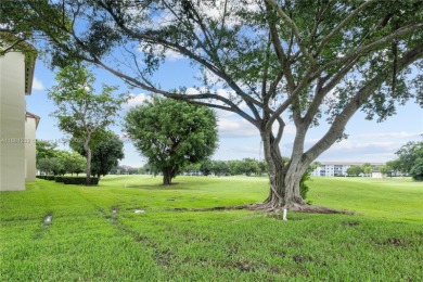2nd Floor Golf Course View in Century Village - Resort-Style on Flamingo Lakes Country Club in Florida - for sale on GolfHomes.com, golf home, golf lot
