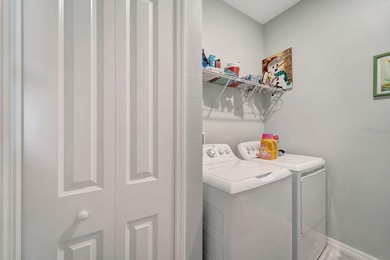 Elegantly maintained and beautifully appointed, this 3-bedroom on The Founders Golf Club in Florida - for sale on GolfHomes.com, golf home, golf lot