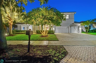 WELCOME TO THIS STUNNING COMPLETELY REMODELED 2 STORY RESIDENCE on Weston Hills Country Club in Florida - for sale on GolfHomes.com, golf home, golf lot