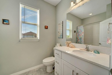 Elegantly maintained and beautifully appointed, this 3-bedroom on The Founders Golf Club in Florida - for sale on GolfHomes.com, golf home, golf lot