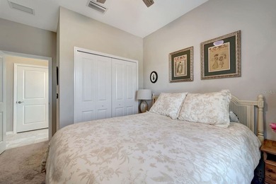 Elegantly maintained and beautifully appointed, this 3-bedroom on The Founders Golf Club in Florida - for sale on GolfHomes.com, golf home, golf lot