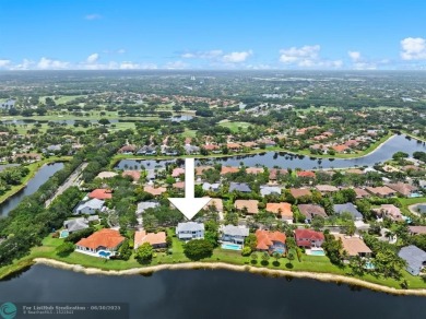 WELCOME TO THIS STUNNING COMPLETELY REMODELED 2 STORY RESIDENCE on Weston Hills Country Club in Florida - for sale on GolfHomes.com, golf home, golf lot