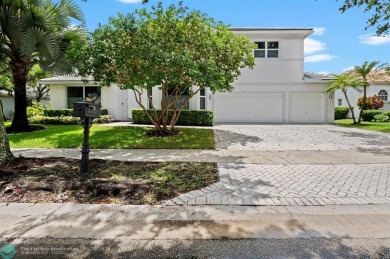 WELCOME TO THIS STUNNING COMPLETELY REMODELED 2 STORY RESIDENCE on Weston Hills Country Club in Florida - for sale on GolfHomes.com, golf home, golf lot