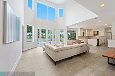 WELCOME TO THIS STUNNING COMPLETELY REMODELED 2 STORY RESIDENCE on Weston Hills Country Club in Florida - for sale on GolfHomes.com, golf home, golf lot