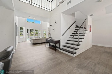 WELCOME TO THIS STUNNING COMPLETELY REMODELED 2 STORY RESIDENCE on Weston Hills Country Club in Florida - for sale on GolfHomes.com, golf home, golf lot