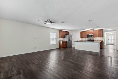 Welcome to this meticulously maintained 4-bedroom, 2-bath on Grand Reserve Golf Course in Florida - for sale on GolfHomes.com, golf home, golf lot
