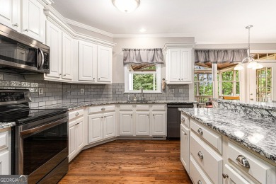 Welcome to your dream home in the prestigious Woodmont Golf and on Woodmont Golf and Country Club in Georgia - for sale on GolfHomes.com, golf home, golf lot