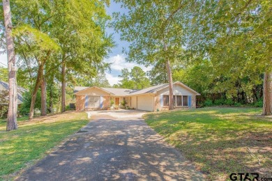 Lovely home close to park and swimming pool, offering a great on Hide-A-Way Lake Golf Course in Texas - for sale on GolfHomes.com, golf home, golf lot