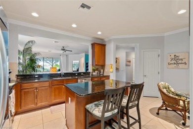 PREMIUM GOLF & WATER VIEW ~ FORMER MODEL HOME ~ TURNKEY with on Panther Run Golf Club in Florida - for sale on GolfHomes.com, golf home, golf lot