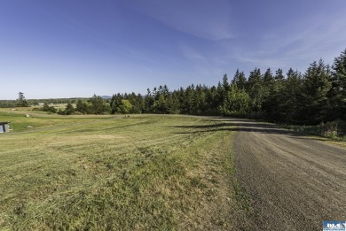 Beautiful parcel up Cays Rd. amongst gorgeous estate homes on on The Cedars At Dungeness in Washington - for sale on GolfHomes.com, golf home, golf lot