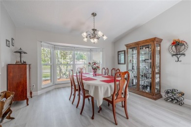 Beautifully maintained 3-bedroom, 2-bath pool home in the on East Lake Woodlands Country Club in Florida - for sale on GolfHomes.com, golf home, golf lot