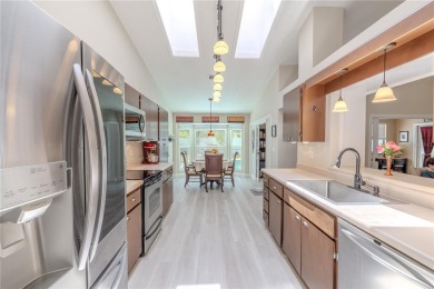Beautifully maintained 3-bedroom, 2-bath pool home in the on East Lake Woodlands Country Club in Florida - for sale on GolfHomes.com, golf home, golf lot