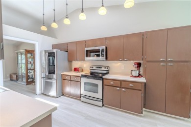 Beautifully maintained 3-bedroom, 2-bath pool home in the on East Lake Woodlands Country Club in Florida - for sale on GolfHomes.com, golf home, golf lot