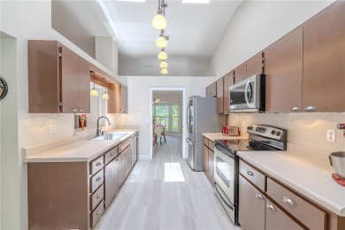 Beautifully maintained 3-bedroom, 2-bath pool home in the on East Lake Woodlands Country Club in Florida - for sale on GolfHomes.com, golf home, golf lot