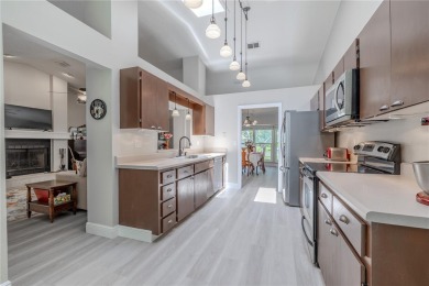 Beautifully maintained 3-bedroom, 2-bath pool home in the on East Lake Woodlands Country Club in Florida - for sale on GolfHomes.com, golf home, golf lot
