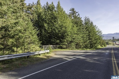 Beautiful parcel up Cays Rd. amongst gorgeous estate homes on on The Cedars At Dungeness in Washington - for sale on GolfHomes.com, golf home, golf lot