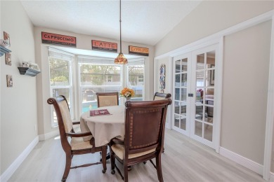 Beautifully maintained 3-bedroom, 2-bath pool home in the on East Lake Woodlands Country Club in Florida - for sale on GolfHomes.com, golf home, golf lot