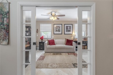 Beautifully maintained 3-bedroom, 2-bath pool home in the on East Lake Woodlands Country Club in Florida - for sale on GolfHomes.com, golf home, golf lot