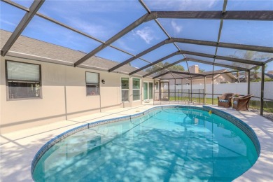 Beautifully maintained 3-bedroom, 2-bath pool home in the on East Lake Woodlands Country Club in Florida - for sale on GolfHomes.com, golf home, golf lot