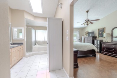 Beautifully maintained 3-bedroom, 2-bath pool home in the on East Lake Woodlands Country Club in Florida - for sale on GolfHomes.com, golf home, golf lot