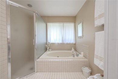 Beautifully maintained 3-bedroom, 2-bath pool home in the on East Lake Woodlands Country Club in Florida - for sale on GolfHomes.com, golf home, golf lot