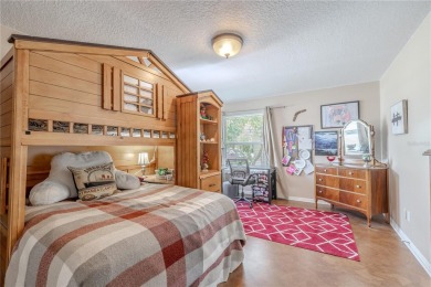 Beautifully maintained 3-bedroom, 2-bath pool home in the on East Lake Woodlands Country Club in Florida - for sale on GolfHomes.com, golf home, golf lot