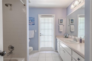 Beautifully maintained 3-bedroom, 2-bath pool home in the on East Lake Woodlands Country Club in Florida - for sale on GolfHomes.com, golf home, golf lot